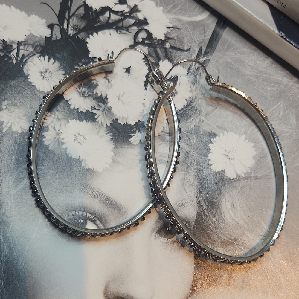Oversized oval silver hoops